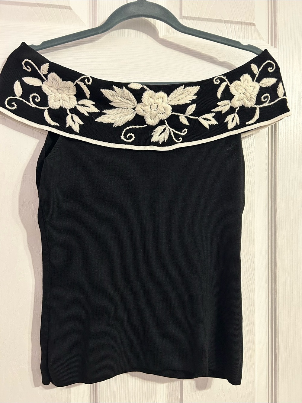 BCBGMaxAzria Black Off-the-Shoulder Knit Top with White Floral Embroidery